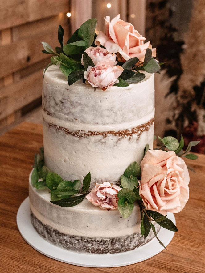 three tier wedding cake with roses